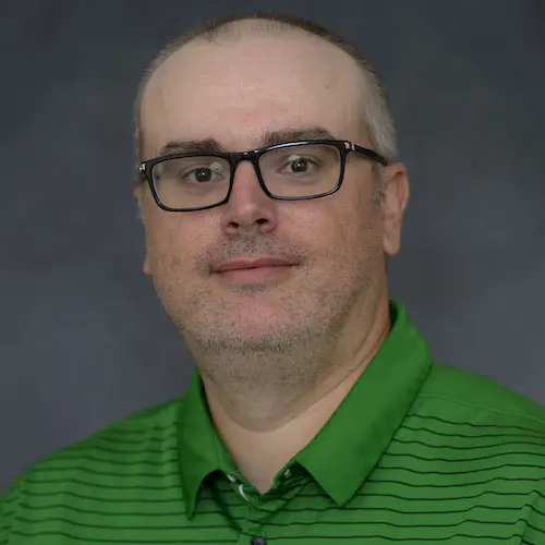 Headshot of Christopher McComas